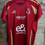 تيشرت الأهلي الرسمي – شجع كأنك في التالتة شمال - Al Ahly Official T-Shirt – Cheer Like You're at the Stadium