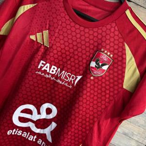 تيشرت الأهلي الرسمي – شجع كأنك في التالتة شمال - Al Ahly Official T-Shirt – Cheer Like You're at the Stadium